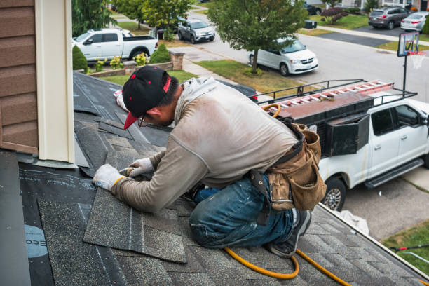 Professional Roofing technician working in Myra, WV
